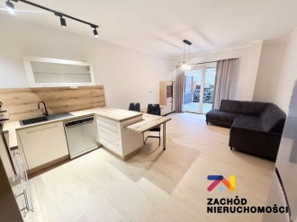 Apartament z ogródkiem i miejscem postojowym